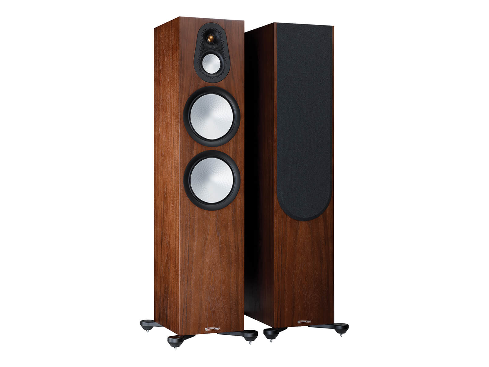 A pair of Monitor Audio's Silver 500 7G, in a natural walnut finish, iso view, with and without grilles.